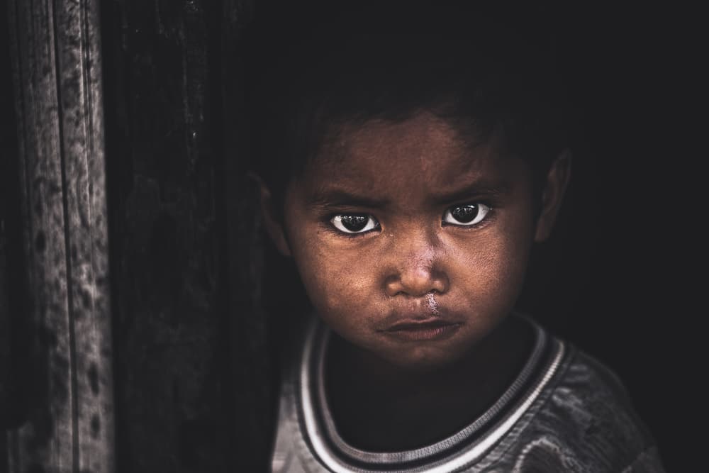 Intense Child Portrait by Marco Tagliarino — canvas wall art