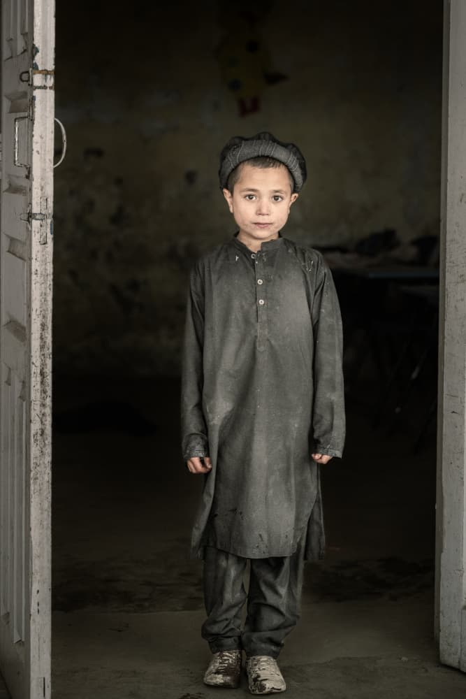 Solemn Boy Portrait by Trevor Cole — canvas wall art