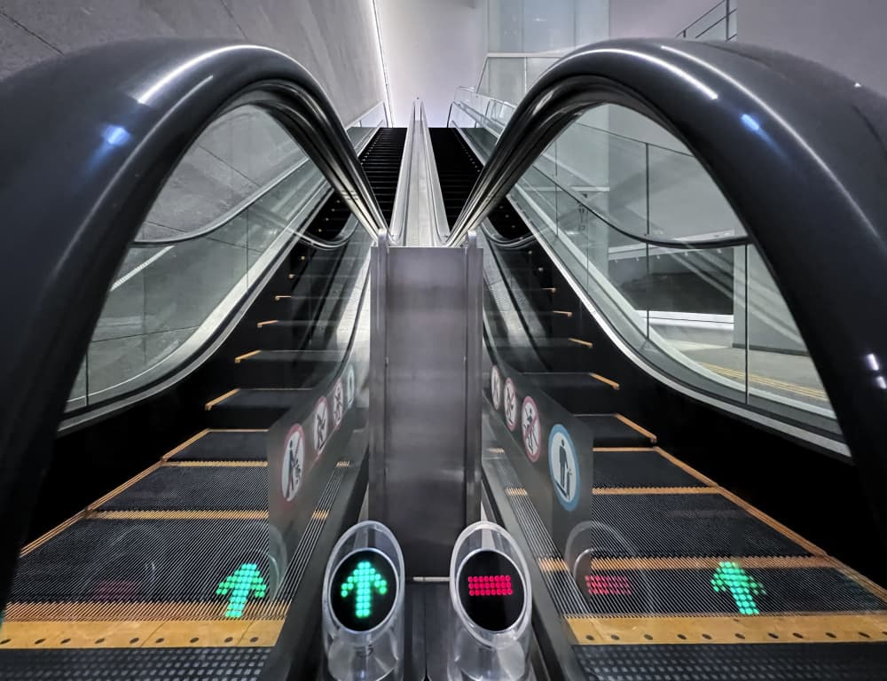 Modern Escalator Ascent by Tomoshi Hara — canvas wall art