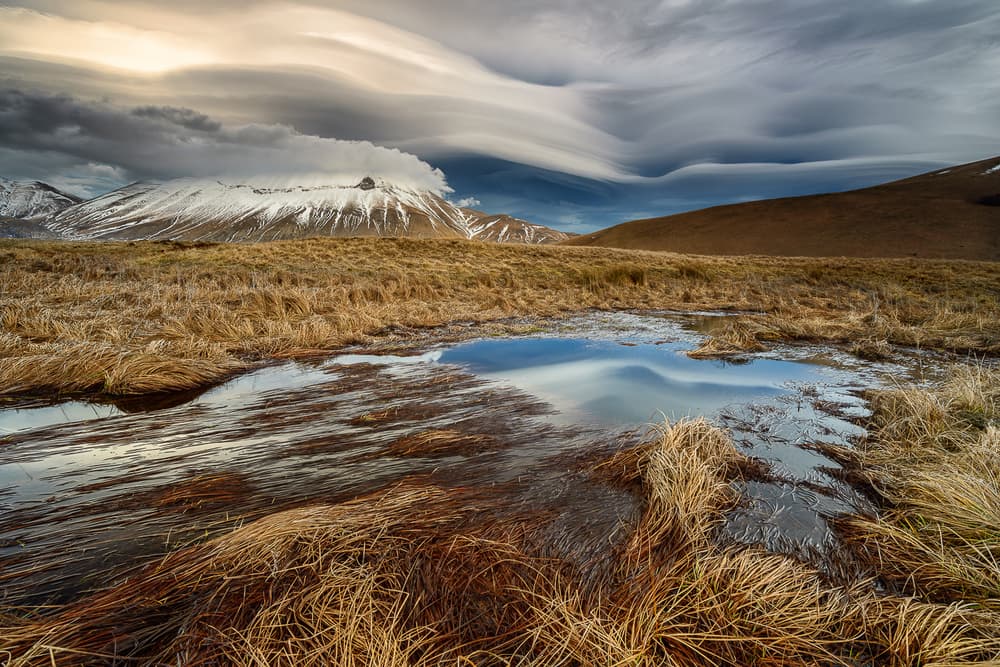 Lenticular Clouds Mountain Reflection by Riccardo Lucidi — canvas wall art