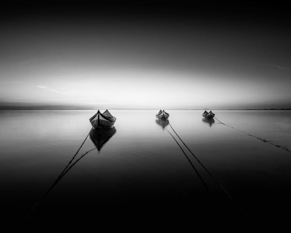 Serene Boats Reflection by Marco Faria — canvas wall art