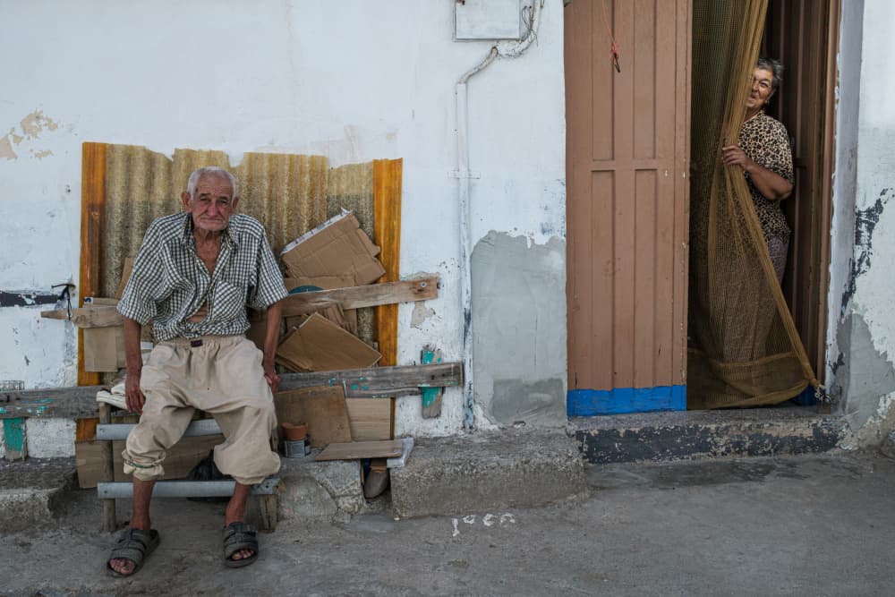 Elderly Couple Smiles by Ali Ayer — canvas wall art