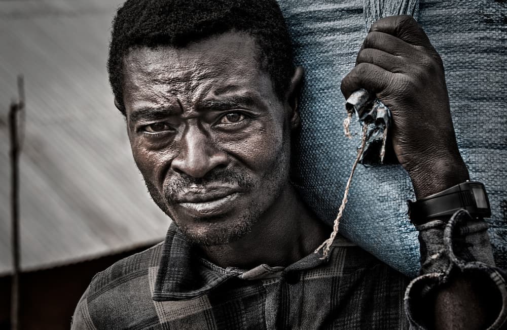 African Worker Portrait by Joxe Inazio Kuesta Garmendia — canvas wall art