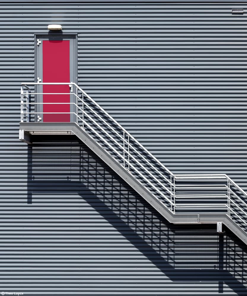 Red Door And Staircase by Theo Luycx — canvas wall art