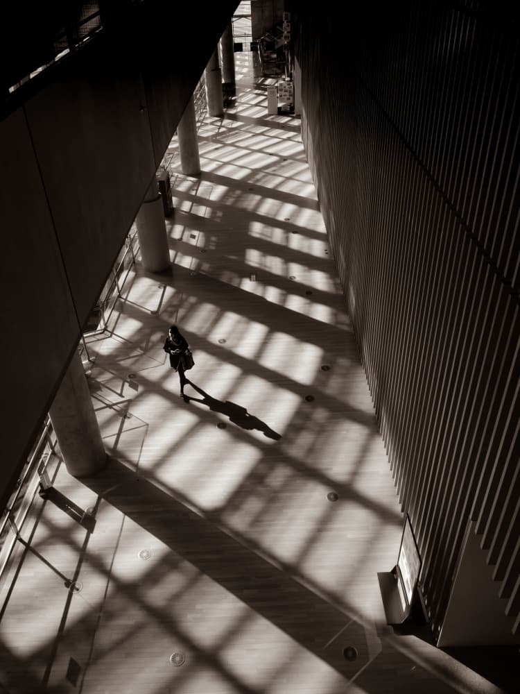 Lone Figure Architectural Shadows by IKUMI FUKAZAWA — canvas wall art