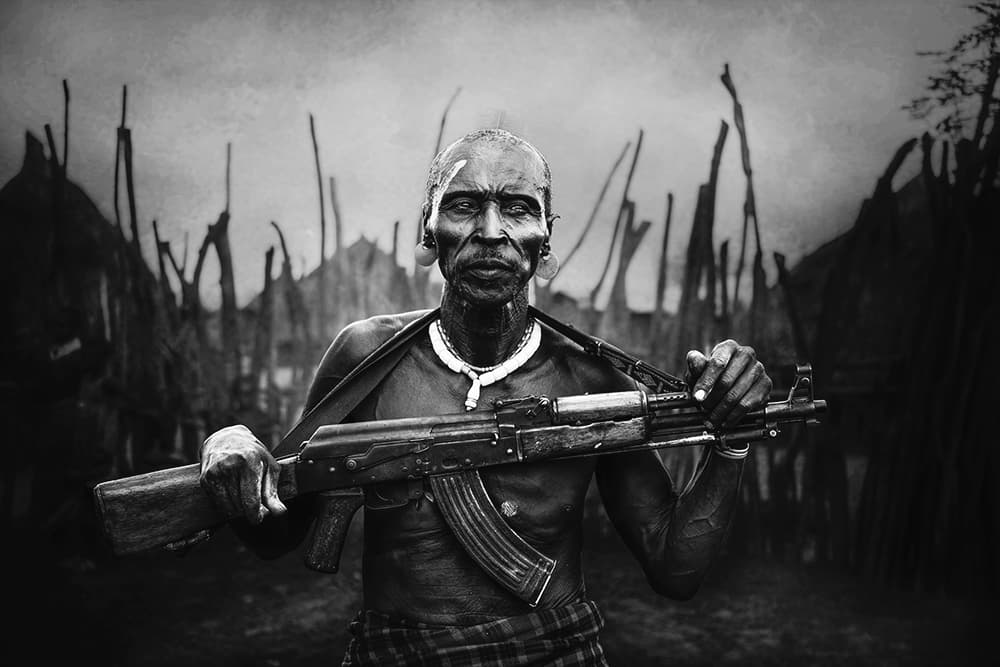 African Warrior with Rifle by Svetlin Yosifov — canvas wall art