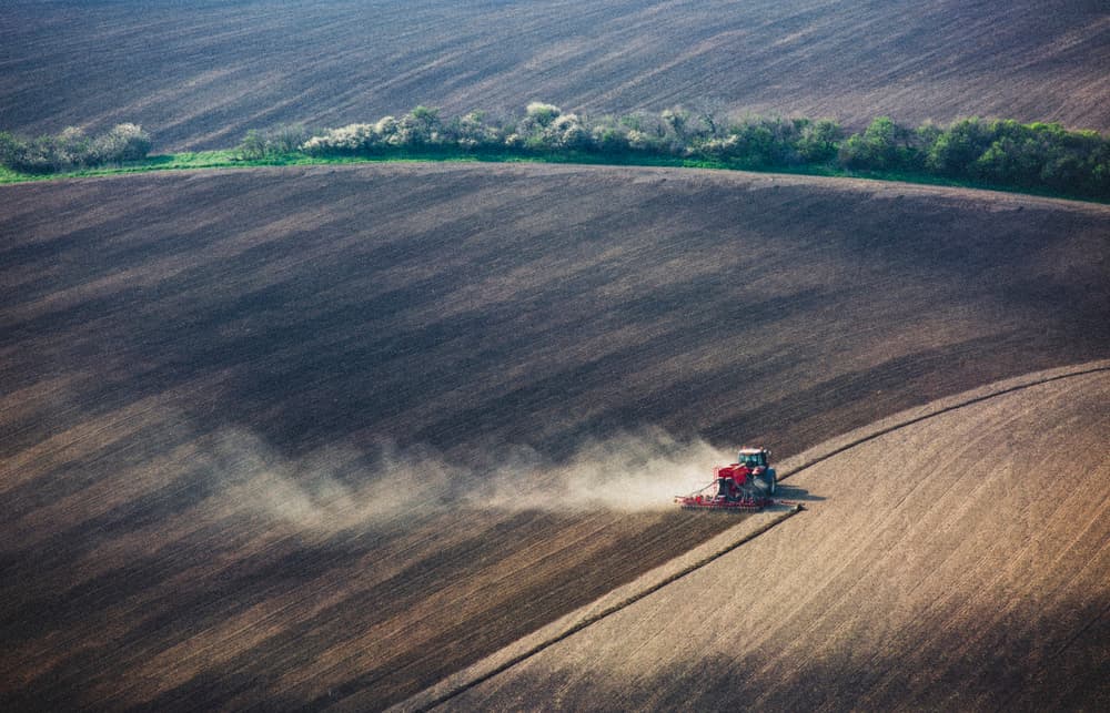 Tractor Plowing Field by Clas Gustafson PRO — canvas wall art