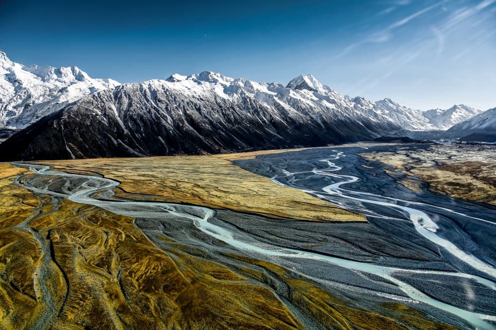 Majestic Alpine River by Tristan Shu — canvas wall art