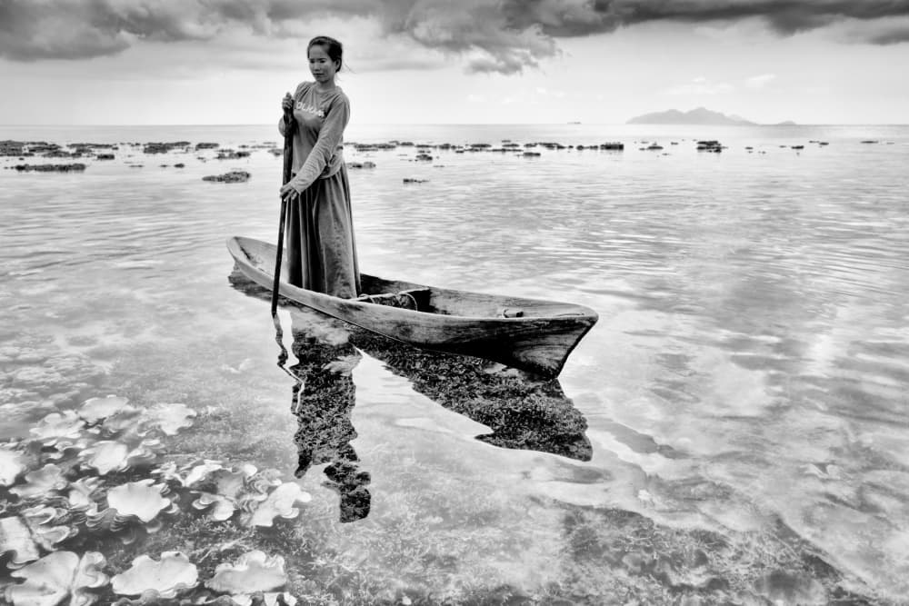 Woman on Tranquil Sea by Kieron Long — canvas wall art