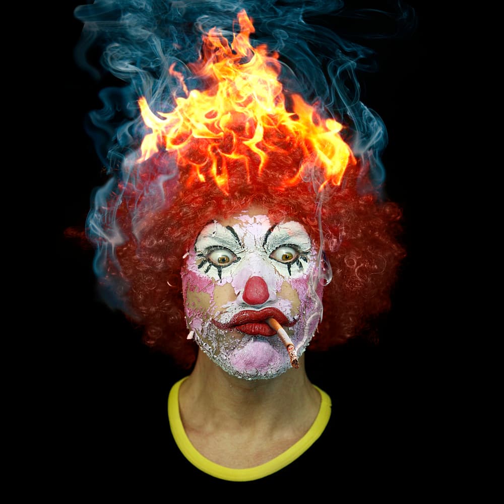 Burning Clown Smoking by DDiArte — canvas wall art
