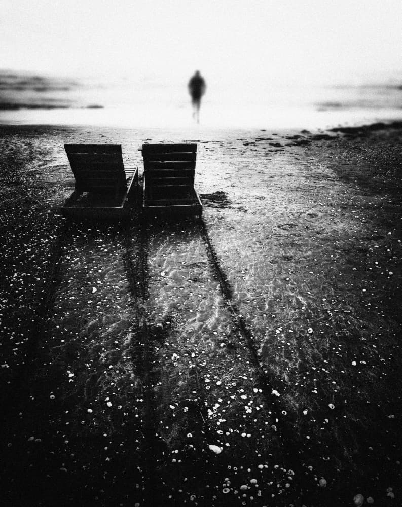 Empty Chairs Distant Figure by Emilian Avramescu — canvas wall art