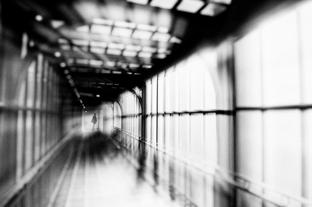 Lone Figure In Corridor by Eric Drigny — canvas wall art
