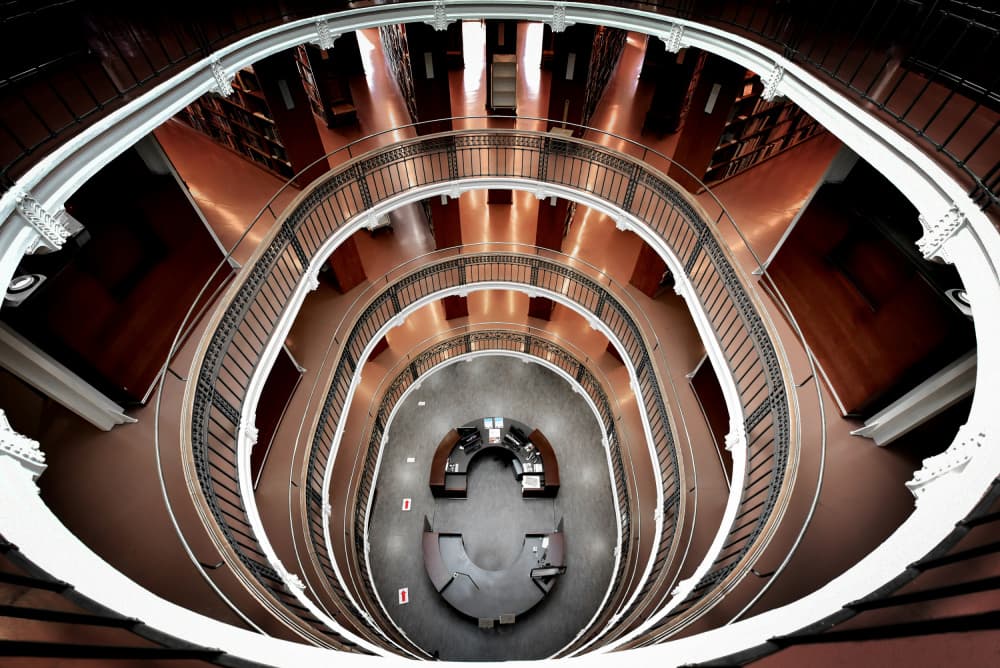 Grand Library Spiral Staircase by Jorge Pimenta — canvas wall art