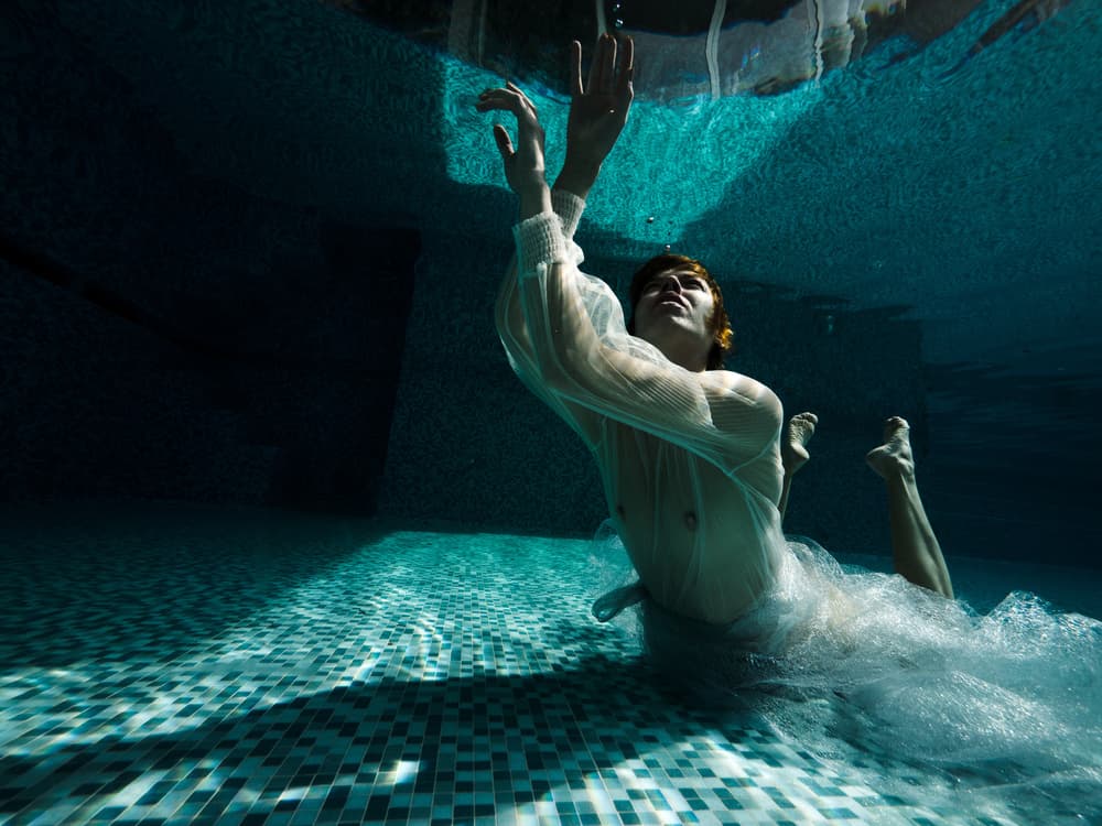 Ethereal Man Underwater by Thanakorn Chai Telan — canvas wall art