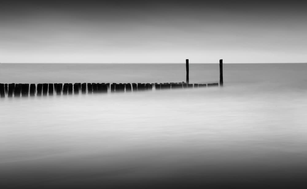 Misty Ocean Groyne by Jan Scheunders — canvas wall art
