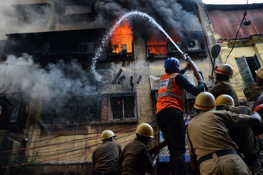Firefighters Combat Blaze by Debarshi Mukherjee — canvas wall art