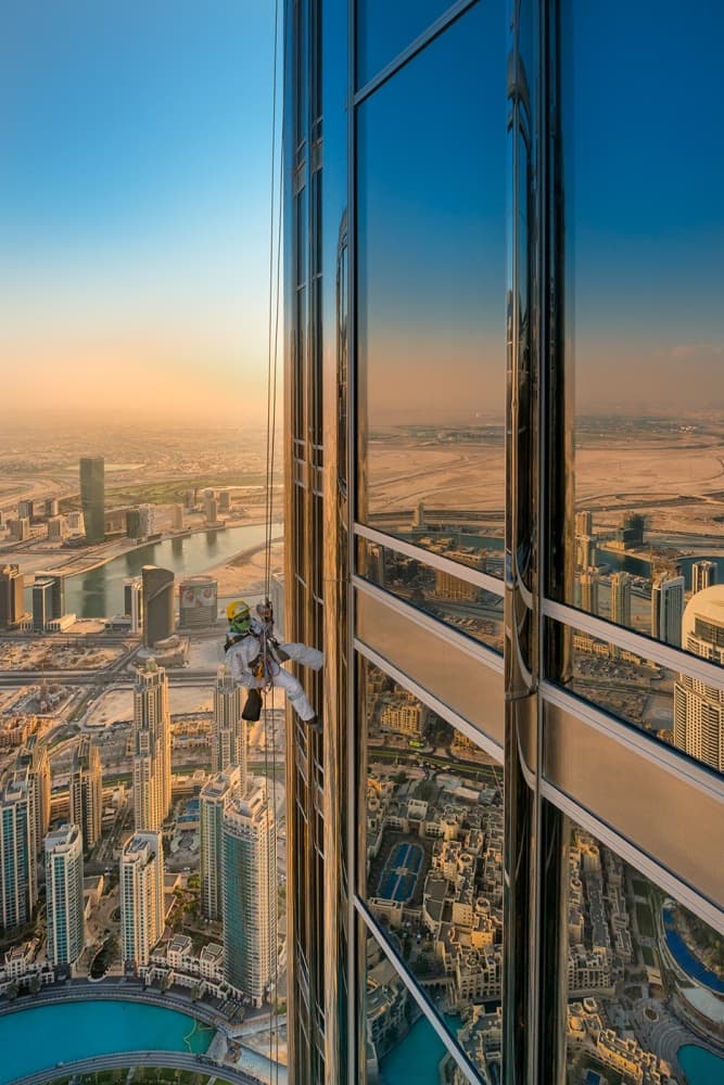 Dubai Skyscraper Cleaner by Jure Kravanja — canvas wall art