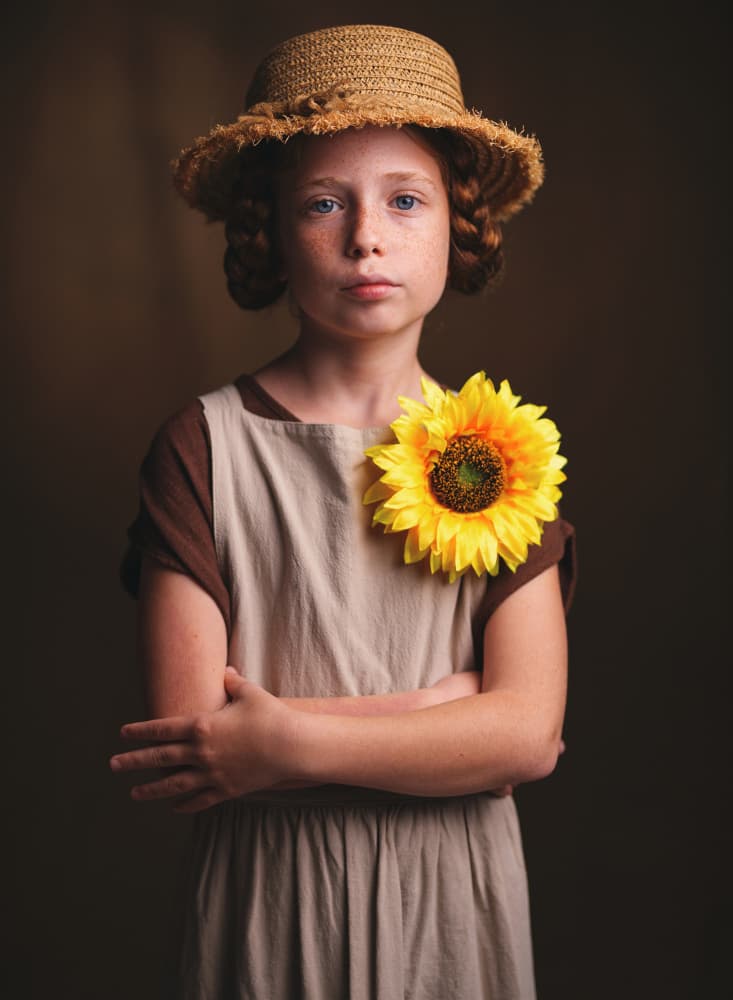 Thoughtful Girl with Sunflower by Offer Ellbogen — canvas wall art