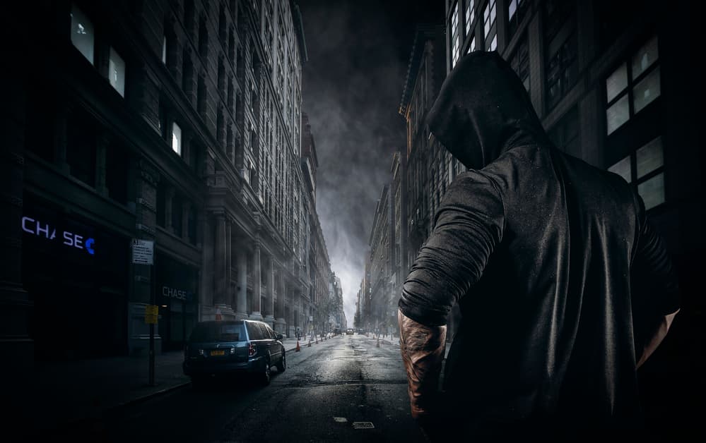 Dark City Hooded Figure by Jackson Carvalho — canvas wall art
