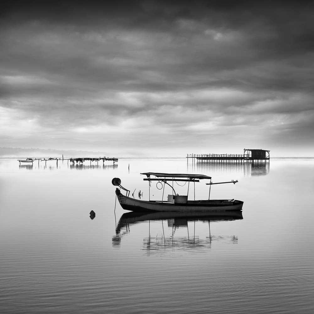 Serene Fishing Boat Reflection by George Digalakis — canvas wall art