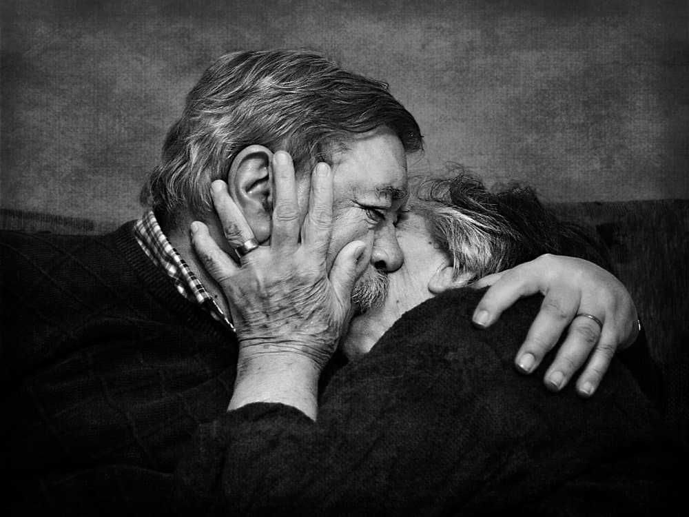 Senior Couple Tender Kiss by Nicoleta Gabor — canvas wall art