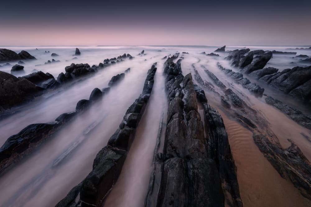 Twilight Coastal Rocks by Karol Nienartowicz — canvas wall art
