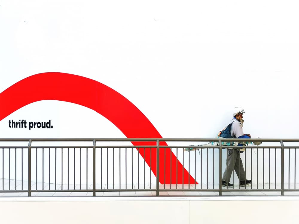 Man Walking Red Curve by Jasmine Zhang — canvas wall art