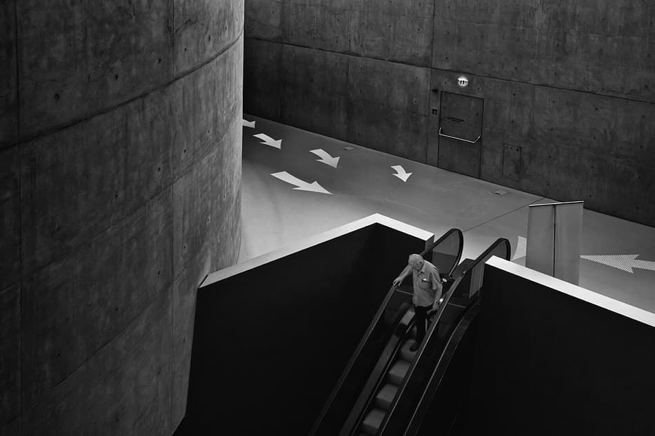 Man on Concrete Escalator by Jure Kravanja — canvas wall art