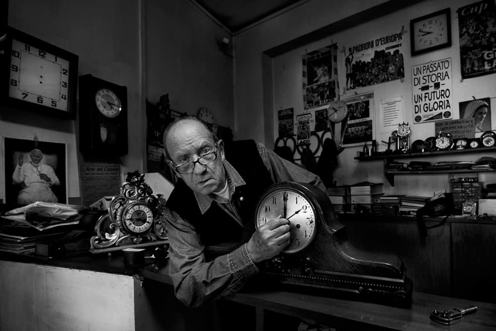Old Clockmaker Adjusting Time by Antonio Grambone — canvas wall art