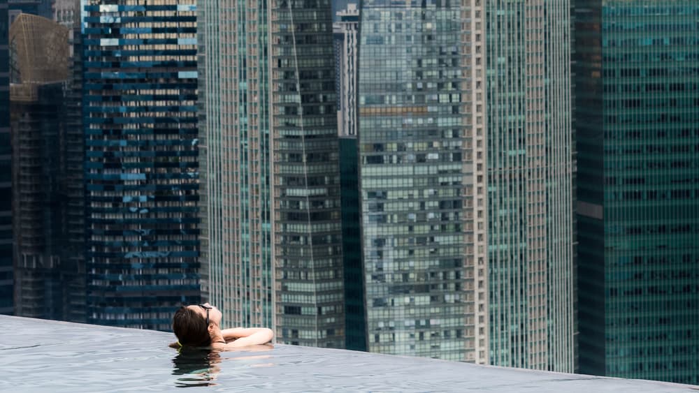 Rooftop City Pool View by Marc Pelissier — canvas wall art