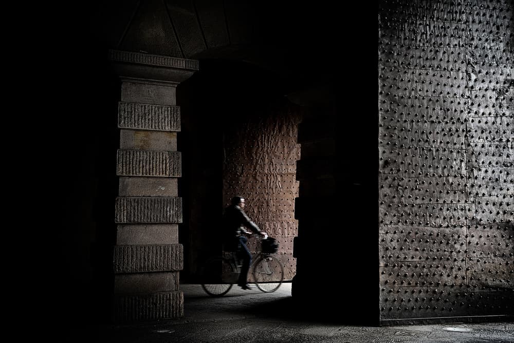 Rider In Dark Archway by Claudio Moretti — canvas wall art
