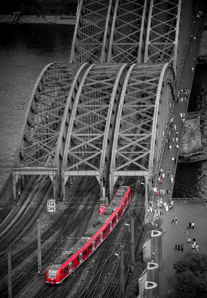 Red Train on Arch Bridge by Zina Heg — canvas wall art
