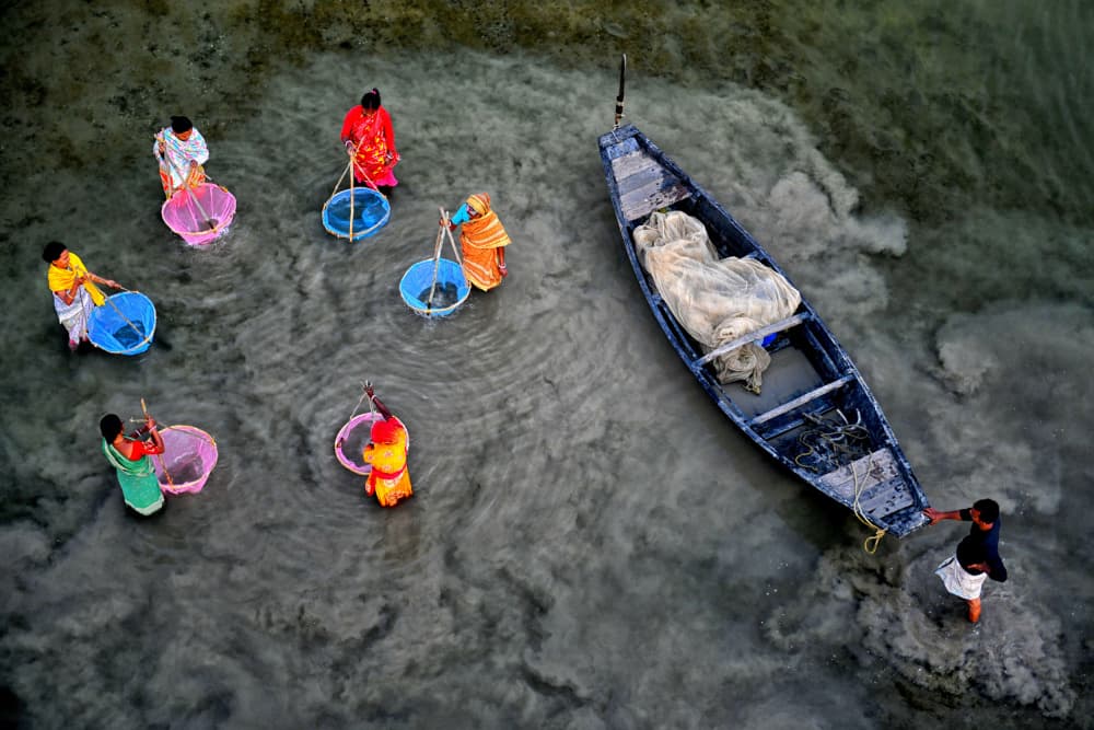 Vibrant River Life by Avishek Das — canvas wall art