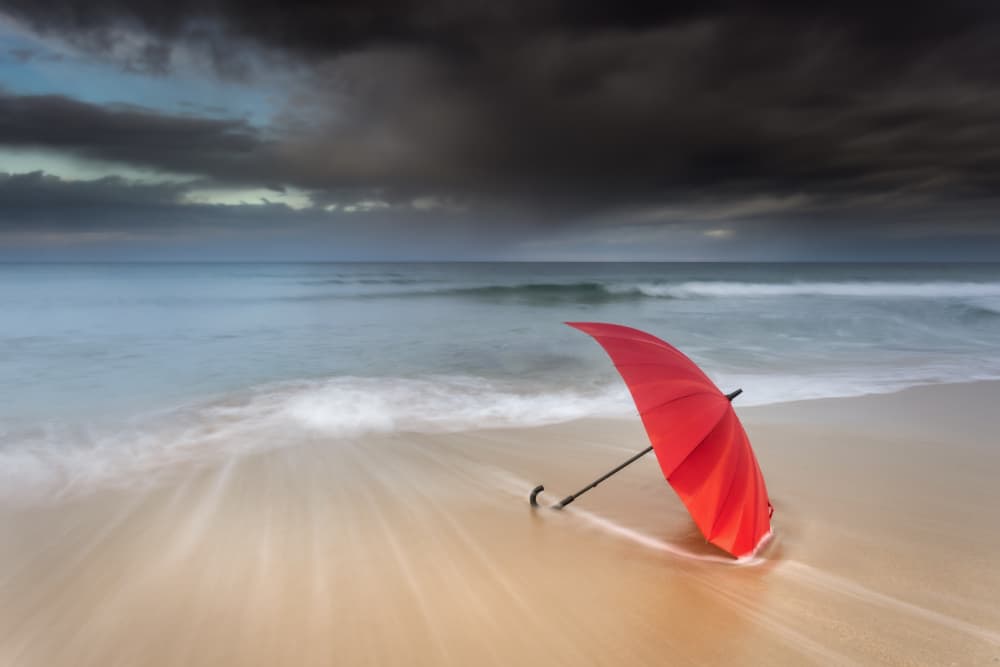 Red Umbrella Beach Serenity by Rico Cavallo — canvas wall art