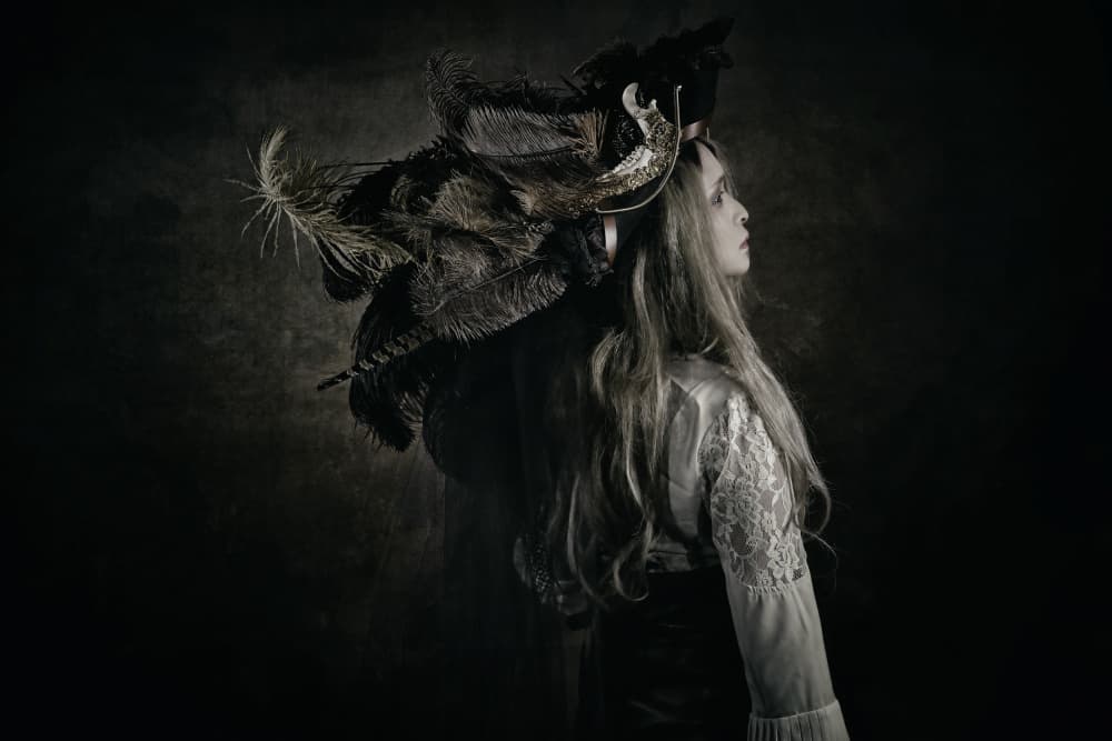 Feathered Elegance Portrait by KOIKI — canvas wall art
