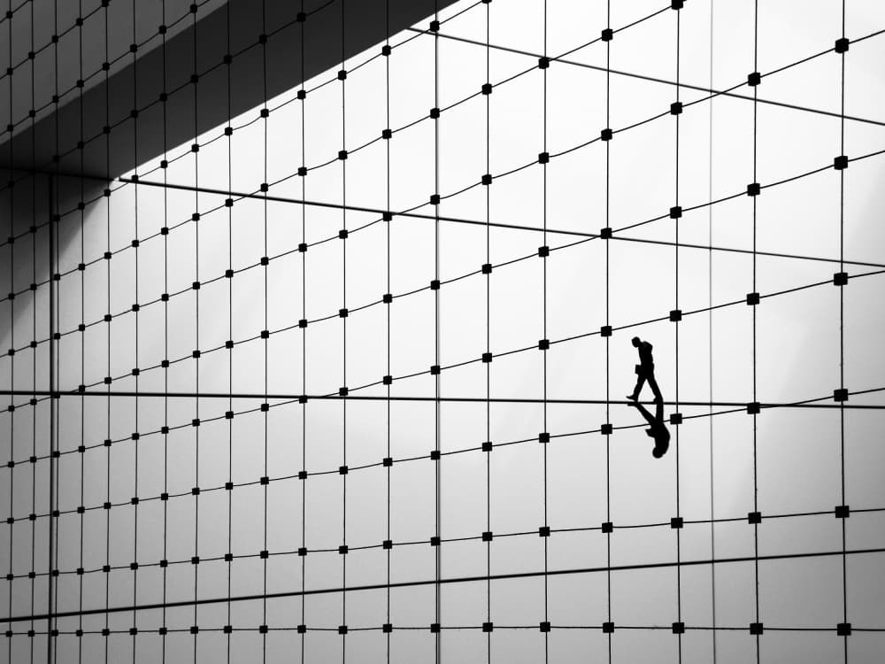 Man Walking Reflection by Huib Limberg — canvas wall art