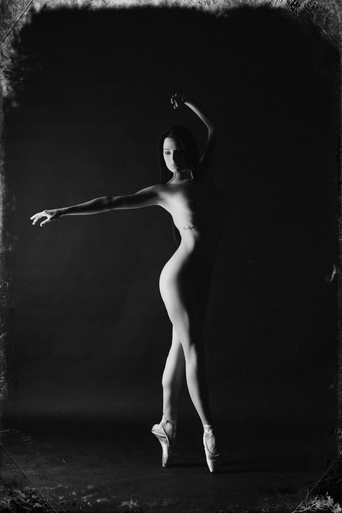 Elegant Ballerina Pose by Ruslan Bolgov — canvas wall art