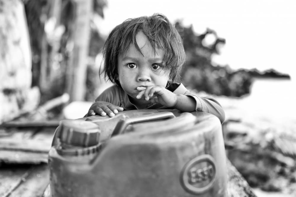 Pensive Child Portrait by Kieron Long — canvas wall art