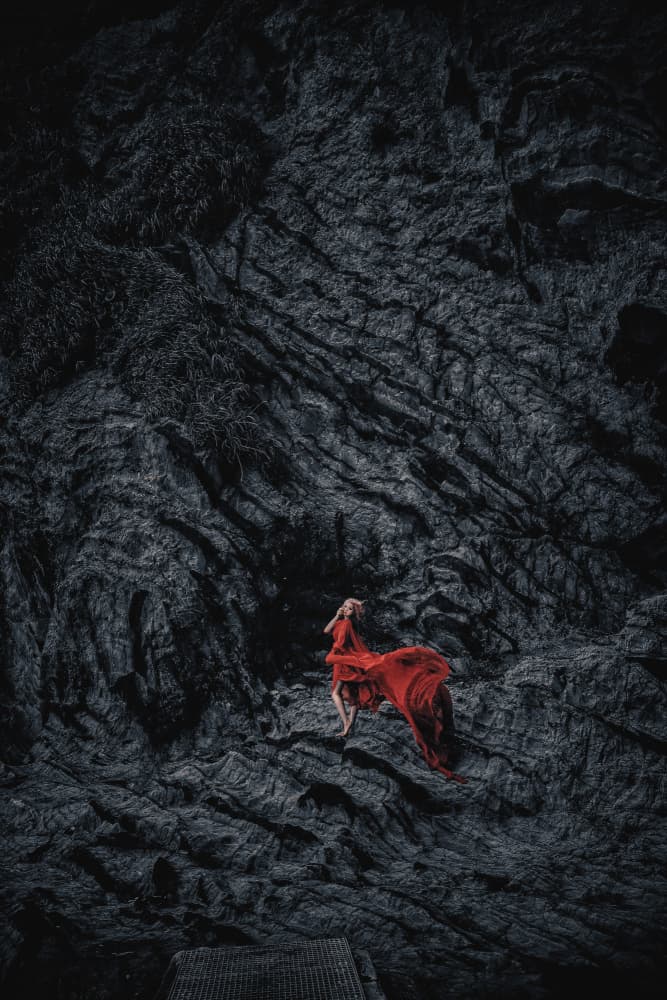 Flowing Red on Dark Rock by KOIKI — canvas wall art