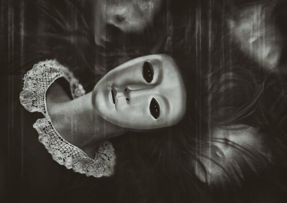 Eerie Doll Face by Sandra Ulfig ARPS — canvas wall art