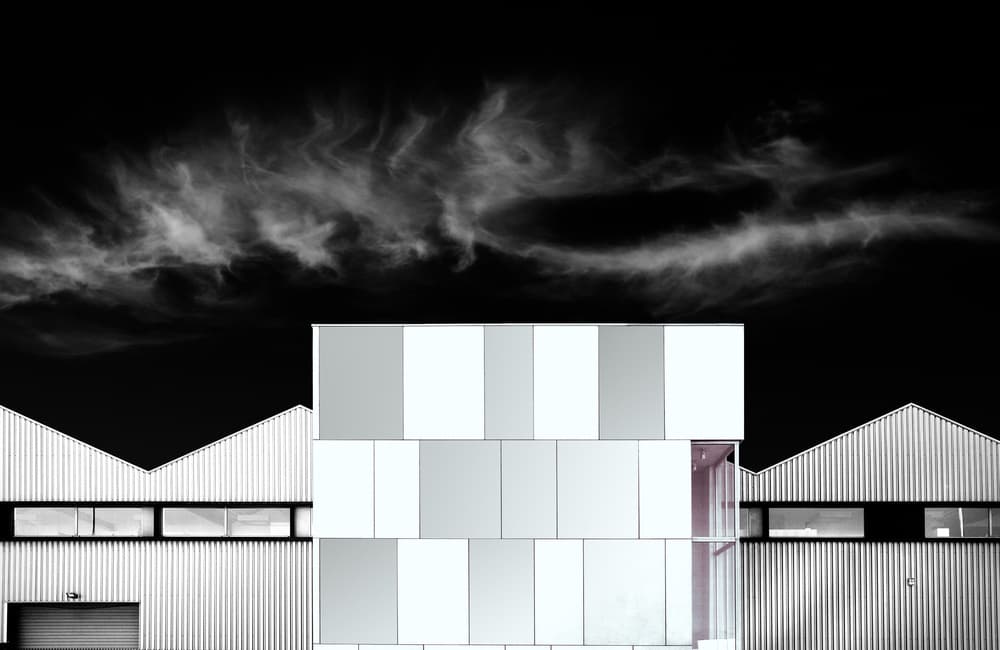 Geometric Buildings Sky by Harry Verschelden — canvas wall art