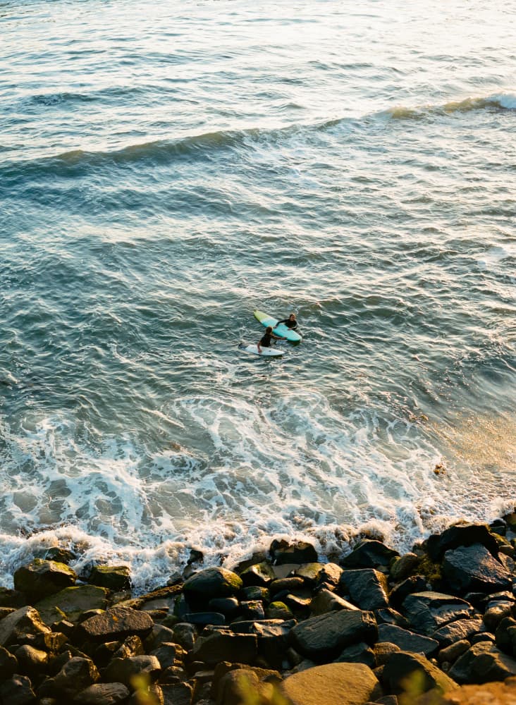 Golden Hour Surfer Waiting by Bethany Young — canvas wall art