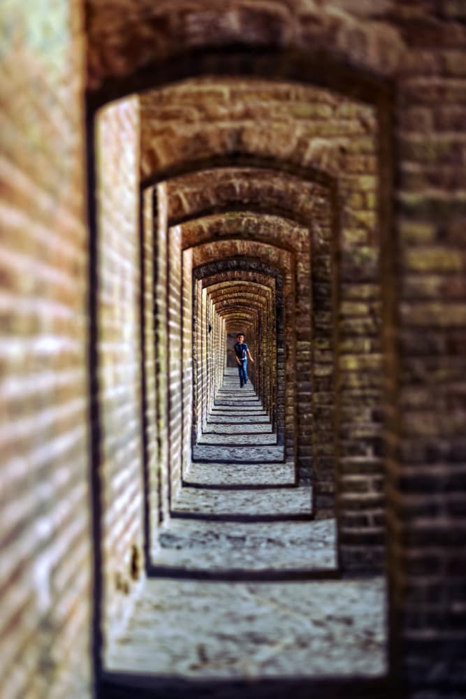 Arched Hallway Perspective by Merthan Kortan — canvas wall art