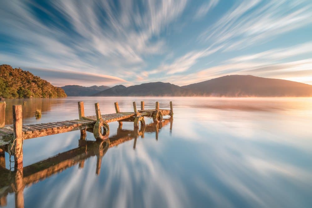 Misty Lake Dock Sunrise by Jana Luo — canvas wall art