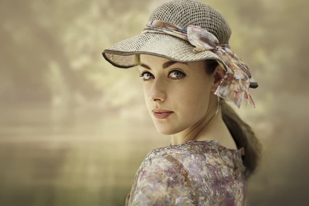 Elegant Woman in Straw Hat by kenp — canvas wall art