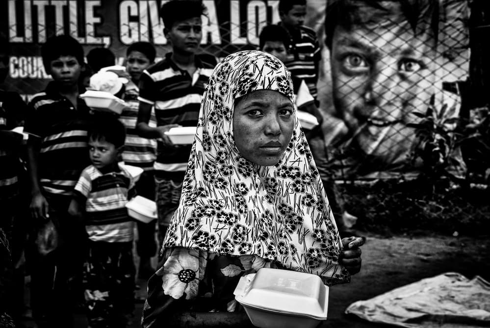 Young Woman's Solemn Gaze by Joxe Inazio Kuesta Garmendia — canvas wall art