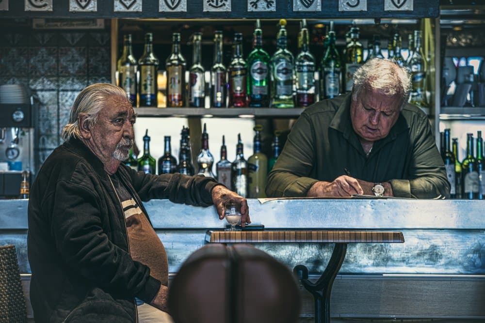 Quiet Bar Conversation by Marco Tagliarino — canvas wall art