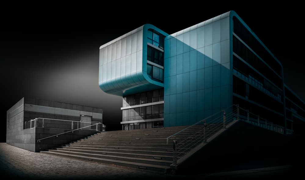 Sleek Blue Building by Jörg Vollrath — canvas wall art