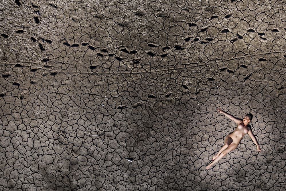 Nude on Cracked Earth by Ovi D. Pop — canvas wall art