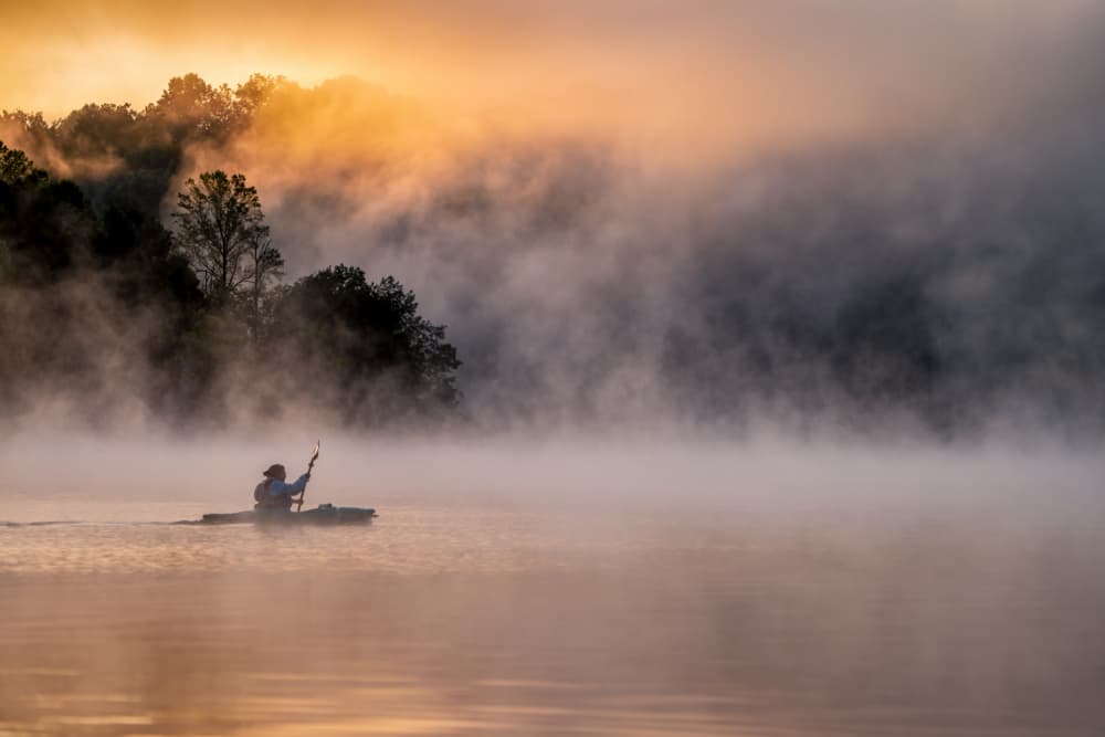 Misty Morning Kayak by Hannah & Wei — canvas wall art